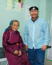 Dr. Fang with a Elder Woman in Mongolia